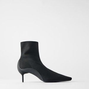 RUBBERIZED HEELED ANKLE BOOTS